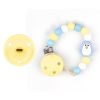 Cajita Chupete Gummy Amarillo Soft + Cadenita de Silicona Pingüino